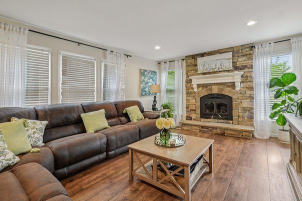 Fireplace, Interior, Living room, Recessed Lighting, Stone Walls, Wood Texture Flooring