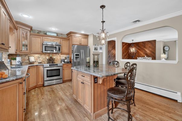 Chandelier, Interior, Kitchen, Pendant Lights, Recessed Lighting, Stainless Steel Appliances, Wood Texture Flooring