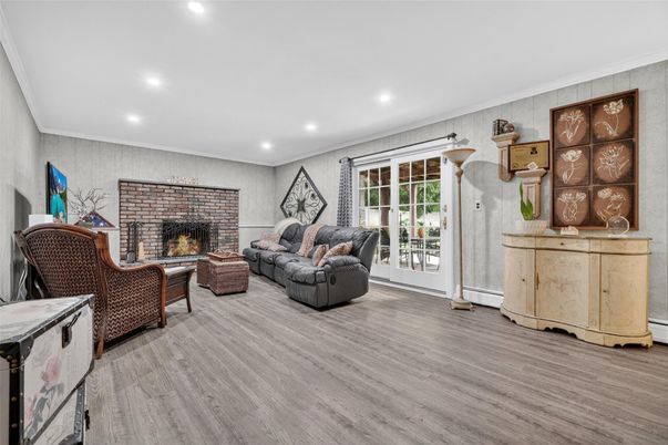 Fireplace, Interior, Living room, Recessed Lighting, Wood Texture Flooring
