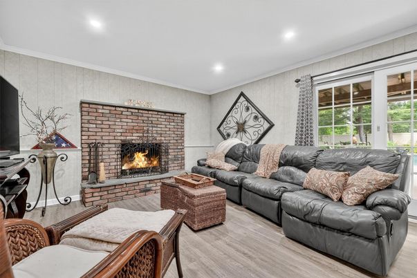 Fireplace, Interior, Living room, Recessed Lighting, Wood Texture Flooring