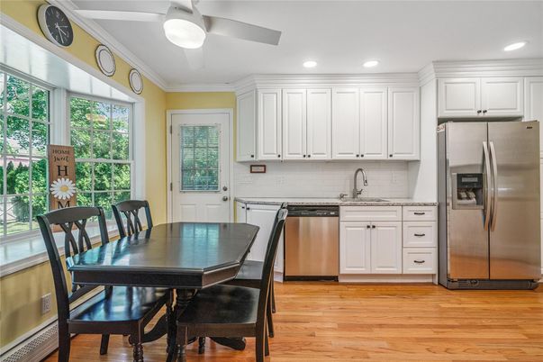 Dining room, Interior, Kitchen, Recessed Lighting, Stainless Steel Appliances, Wood Texture Flooring