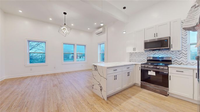Interior, Kitchen, Pendant Lights, Recessed Lighting, Stainless Steel Appliances, Wood Texture Flooring