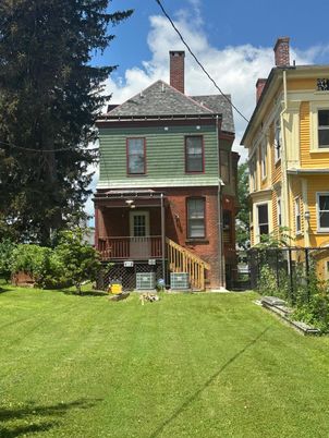 Backyard, Exterior, Facade, Brick Facade, American Foursquare