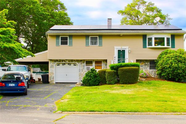 Attached, Exterior, Facade, Solar Panels, Raised Ranch