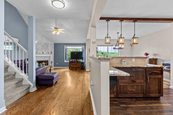 Fireplace, Interior, Marble Walls, Pendant Lights, Wood Texture Flooring