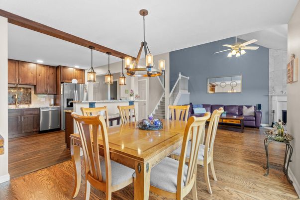 Dining room, Fireplace, Interior, Kitchen, Living room, Pendant Lights, Recessed Lighting, Stainless Steel Appliances, Wood Texture Flooring