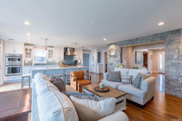 Interior, Kitchen, Living room, Pendant Lights, Recessed Lighting, Stainless Steel Appliances, Stone Walls, Wood Texture Flooring