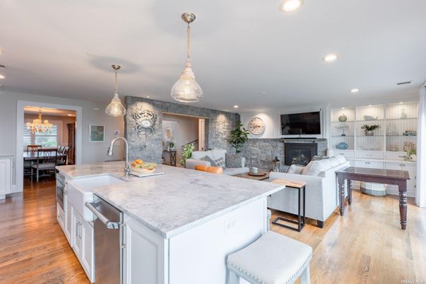 Chandelier, Dining room, Fireplace, Interior, Kitchen, Living room, Pendant Lights, Recessed Lighting, Wood Texture Flooring