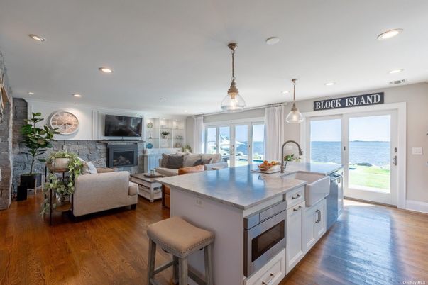 Fireplace, Interior, Kitchen, Living room, Pendant Lights, Recessed Lighting, Water, Wood Texture Flooring