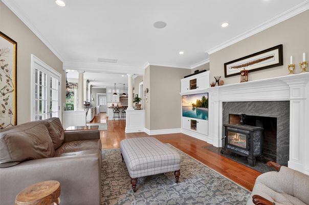 Dining room, Fireplace, Interior, Living room, Pendant Lights, Recessed Lighting, Wood Texture Flooring
