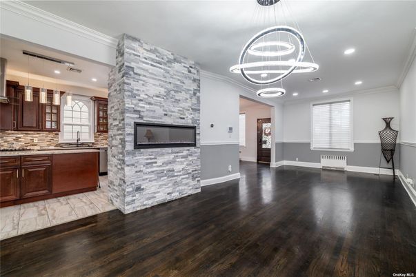 Fireplace, Interior, Kitchen, Pendant Lights, Recessed Lighting, Stone Walls, Wood Texture Flooring