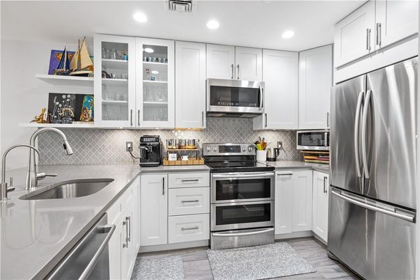 Interior, Kitchen, Recessed Lighting, Stainless Steel Appliances, Wood Texture Flooring