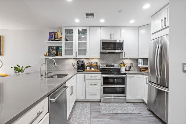Interior, Kitchen, Recessed Lighting, Stainless Steel Appliances, Wood Texture Flooring