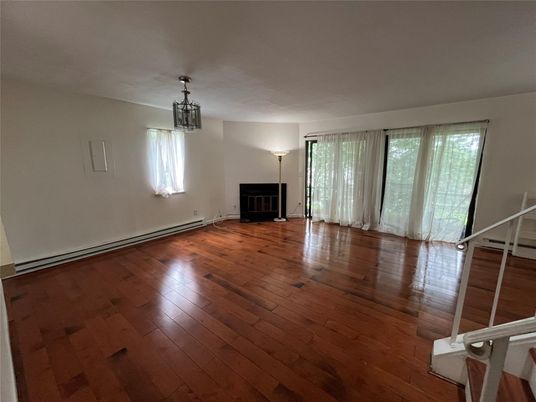 Empty room, Fireplace, Interior, Pendant Lights, Wood Texture Flooring