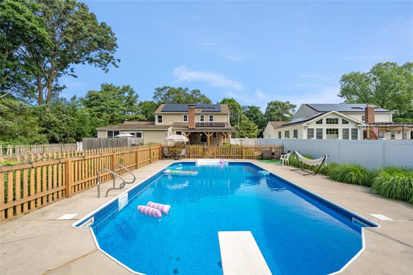 Exterior, Pool, Solar Panels