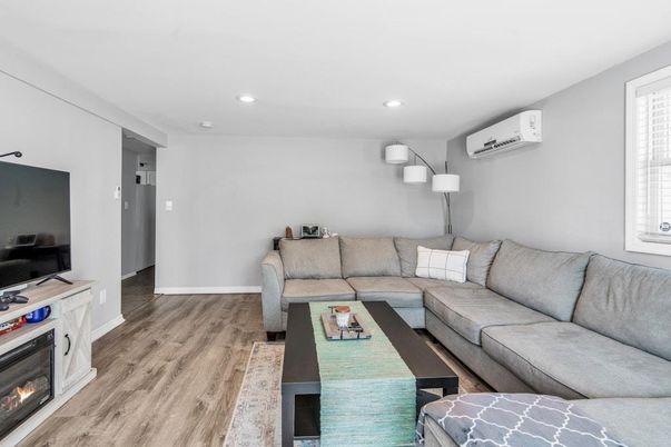 Fireplace, Interior, Living room, Recessed Lighting, Wood Texture Flooring