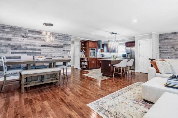 Dining room, Interior, Kitchen, Living room, Pendant Lights, Recessed Lighting, Stainless Steel Appliances, Wood Texture Flooring, Wooden Walls