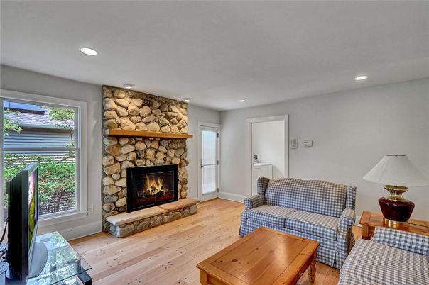 Fireplace, Interior, Recessed Lighting, Stone Walls, Wood Texture Flooring