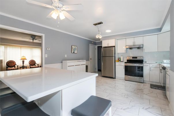 Interior, Kitchen, Marble, Pendant Lights, Recessed Lighting, Stainless Steel Appliances