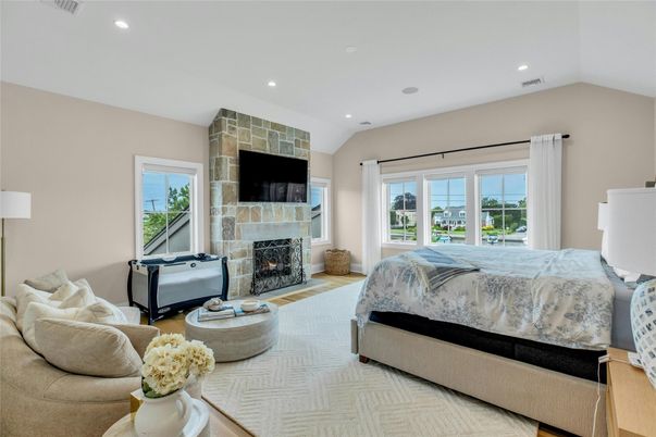 Bedroom, Fireplace, Interior, Recessed Lighting, Wood Texture Flooring