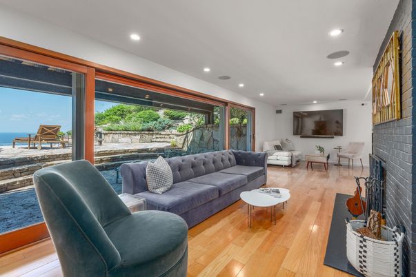 Fireplace, Interior, Living room, Recessed Lighting, Water, Wood Texture Flooring