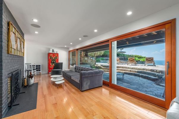 Fireplace, Interior, Living room, Recessed Lighting, Water, Wood Texture Flooring