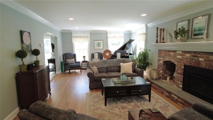Fireplace, Interior, Living room, Piano, Recessed Lighting, Wood Texture Flooring