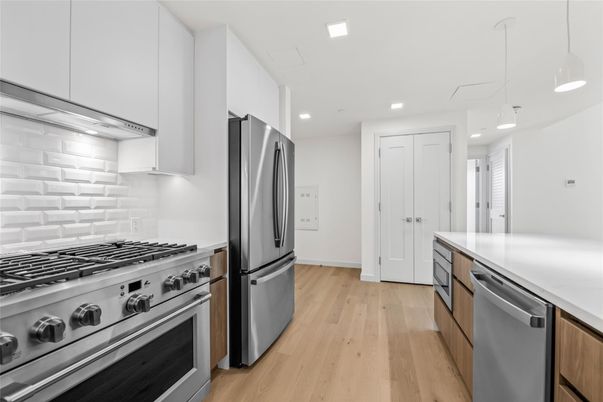 Interior, Kitchen, Pendant Lights, Recessed Lighting, Stainless Steel Appliances, Wood Texture Flooring