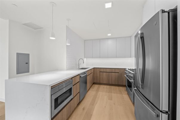 Interior, Kitchen, Pendant Lights, Recessed Lighting, Stainless Steel Appliances, Wood Texture Flooring