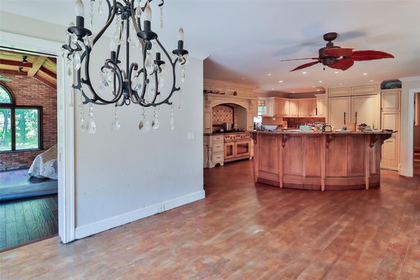 Chandelier, Interior, Kitchen, Recessed Lighting, Stone Walls, Wood Texture Flooring