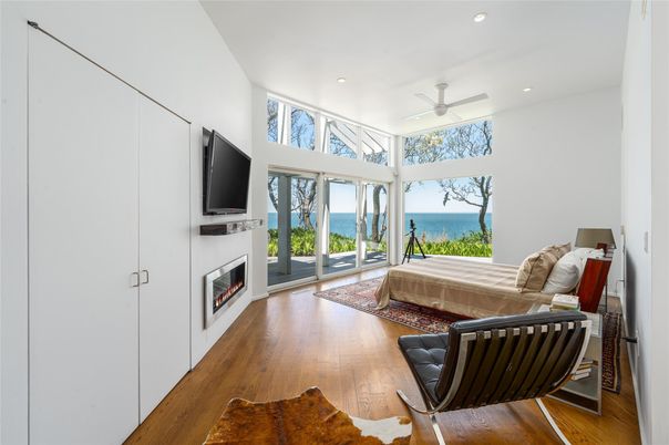 Fireplace, Interior, Living room, Recessed Lighting, Water, Wood Texture Flooring