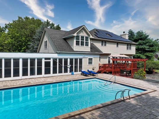 Exterior, Pool, Solar Panels