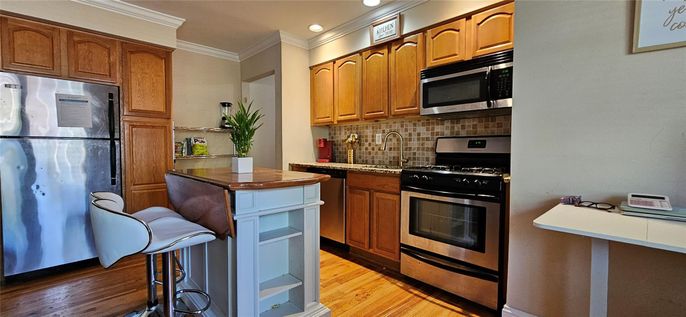 Interior, Kitchen, Recessed Lighting, Stainless Steel Appliances, Wood Texture Flooring