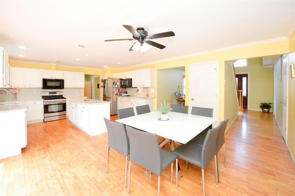 Dining room, Interior, Kitchen, Recessed Lighting, Stainless Steel Appliances, Wood Texture Flooring
