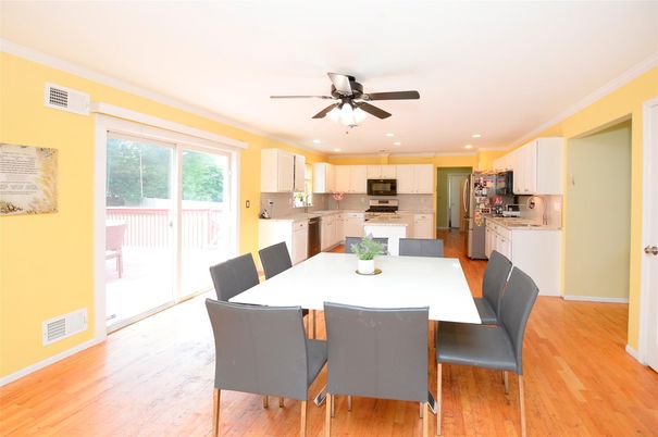 Dining room, Interior, Kitchen, Recessed Lighting, Stainless Steel Appliances, Wood Texture Flooring