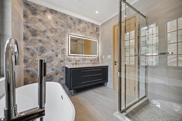 Bathroom, Free Standing Baths, Glass Shower, Interior, Recessed Lighting, Wood Texture Flooring
