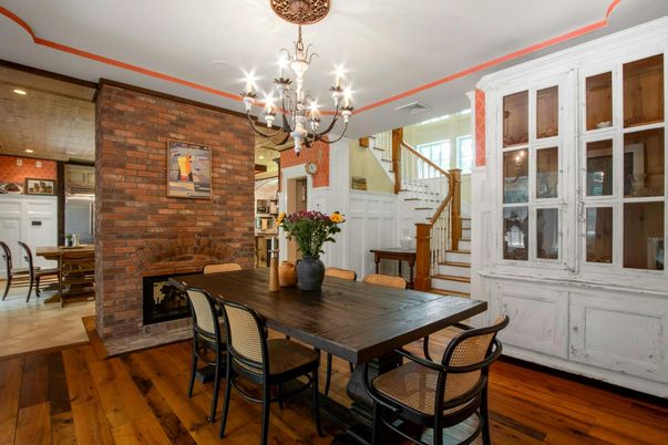 Chandelier, Dining room, Fireplace, Interior, Kitchen, Recessed Lighting, Stone Walls, Wood Texture Flooring
