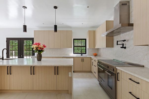 Interior, Kitchen, Marble Walls, Pendant Lights, Recessed Lighting, Stainless Steel Appliances