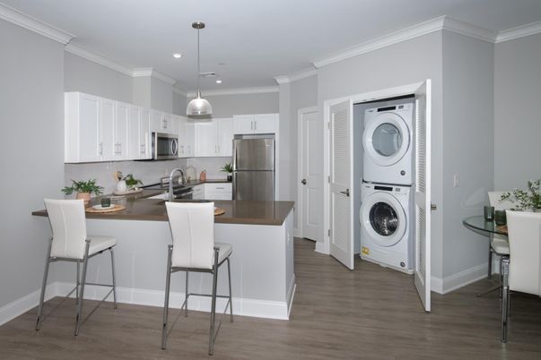 Interior, Kitchen, Pendant Lights, Recessed Lighting, Stainless Steel Appliances, Utility Closets, Washer, Wood Texture Flooring