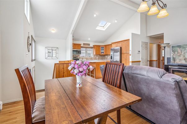 Dining room, Interior, Kitchen, Living room, Recessed Lighting, Stainless Steel Appliances, Wood Texture Flooring