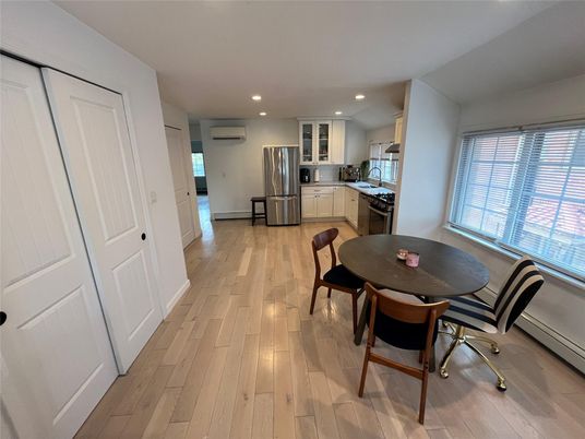 Dining room, Interior, Kitchen, Recessed Lighting, Stainless Steel Appliances, Wood Texture Flooring