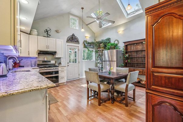 Dining room, Interior, Kitchen, Pendant Lights, Recessed Lighting, Stainless Steel Appliances, Wood Texture Flooring