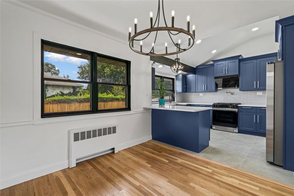 Chandelier, Interior, Kitchen, Recessed Lighting, Stainless Steel Appliances, Wood Texture Flooring