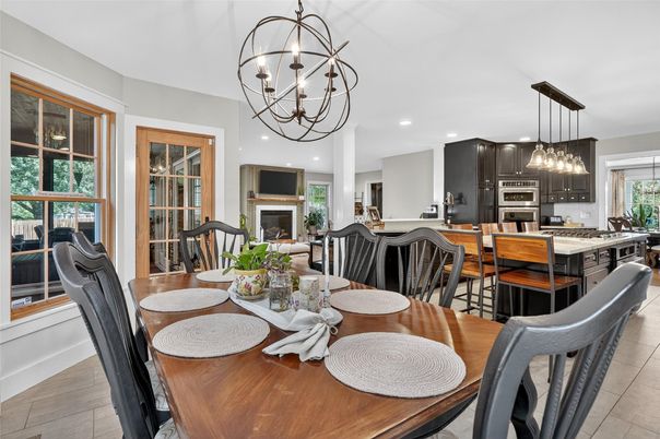 Chandelier, Dining room, Fireplace, Interior, Kitchen, Pendant Lights, Recessed Lighting, Stainless Steel Appliances