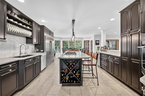 Dining room, Interior, Kitchen, Pendant Lights, Recessed Lighting, Stainless Steel Appliances, Wood Texture Flooring
