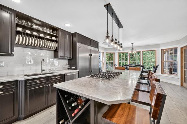 Chandelier, Dining room, Interior, Kitchen, Pendant Lights, Recessed Lighting, Stainless Steel Appliances, Wood Texture Flooring