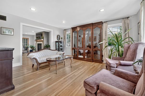 Dining room, Fireplace, Interior, Living room, Recessed Lighting, Wood Texture Flooring