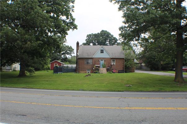 Exterior, Facade, Brick Facade, Cape Cod