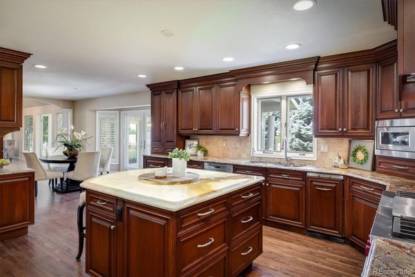 Dining room, Interior, Kitchen, Recessed Lighting, Stainless Steel Appliances, Wood Texture Flooring