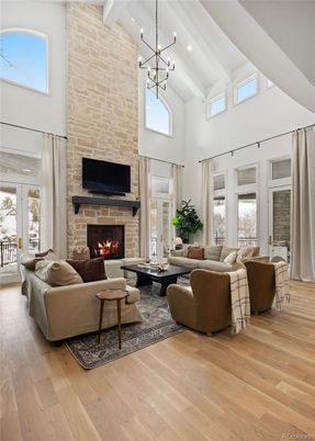 Fireplace, Interior, Living room, Pendant Lights, Recessed Lighting, Stone Walls, Wood Texture Flooring